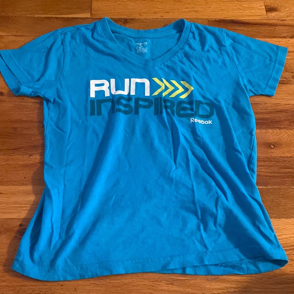 Reebok blue v-neck tee shirt